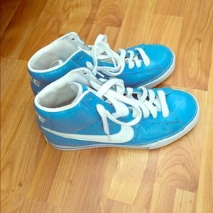 Blue Nike high tops